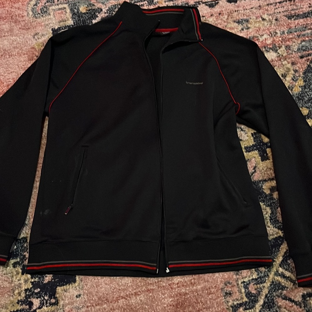 I am selling a mens zip up polo jacket!